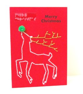 dancing reindeer with glitter antlers and pom pom nose
